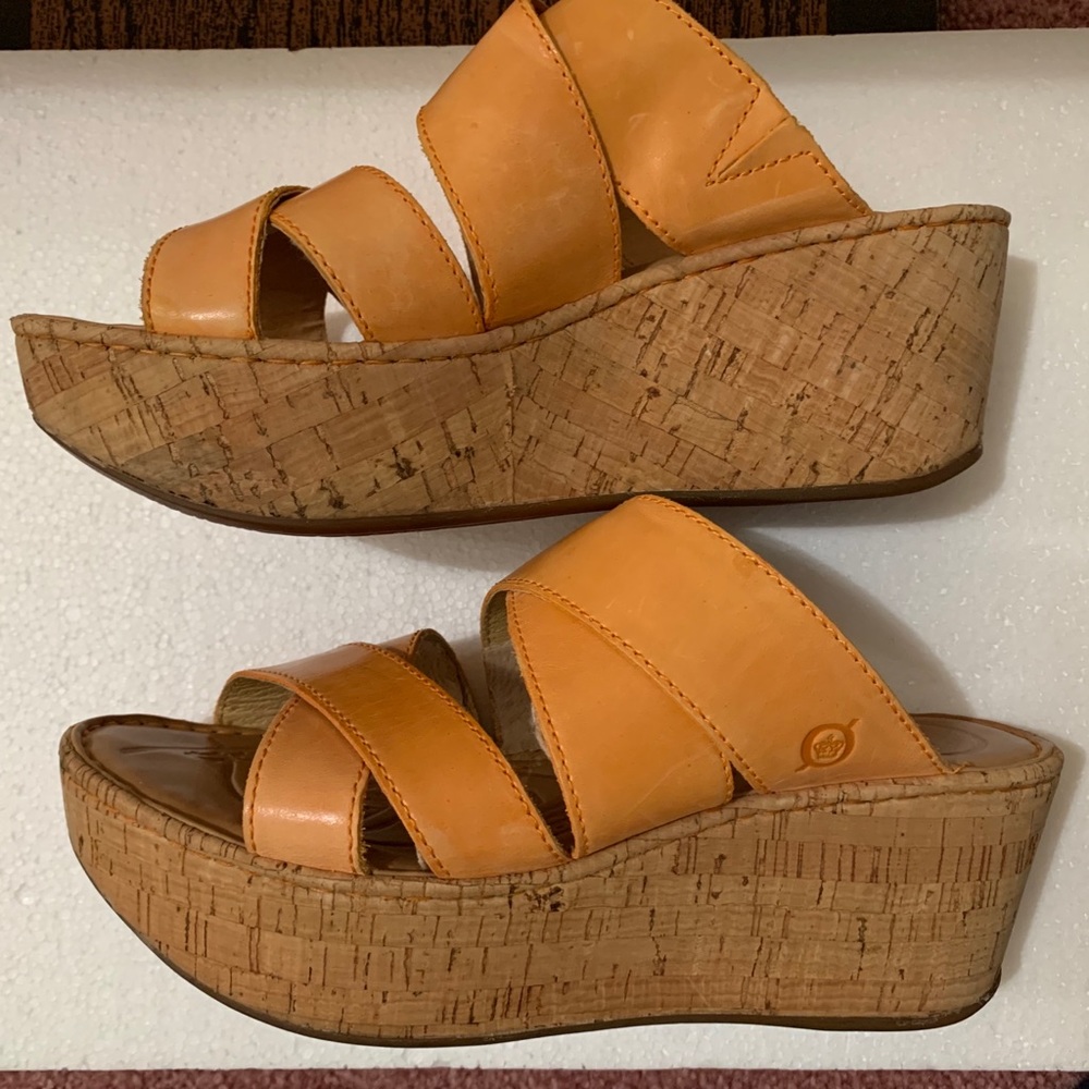 Born creamsicle color platform sandals.